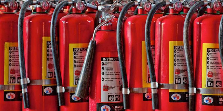 A photo collection of fire extinguishers